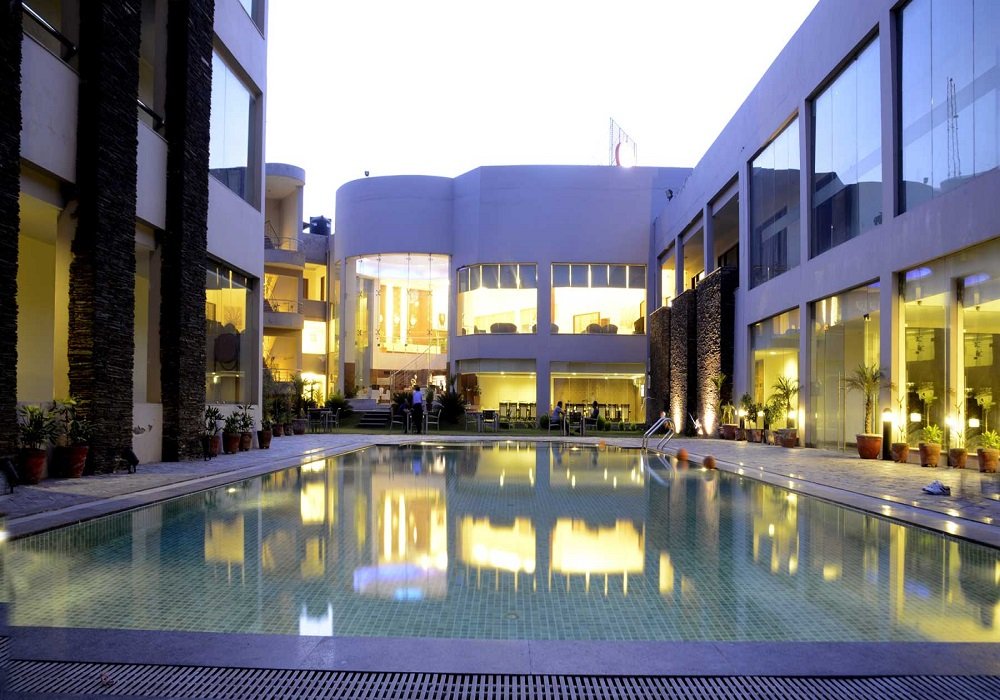 Hans Resort Rewari resort view with seating for visiting groups